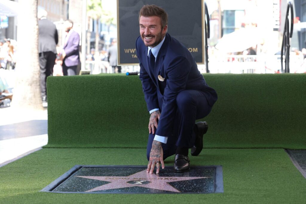 Football legend David Beckham receives a Walk of Fame star